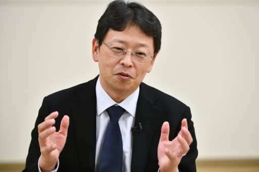 Japan may need to reconsider holding the Olympics if it cannot bring domestic transmissions of the new coronavirus under control, an expert has warned