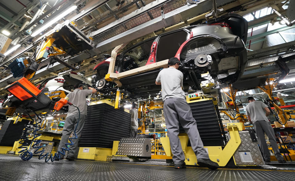 Workers on the production line at Nissan's factory in Sunderland after they were told that the car manufacturer is to end the night shift at its UK plant. (Photo by Owen Humphreys/PA Images via Getty Images)