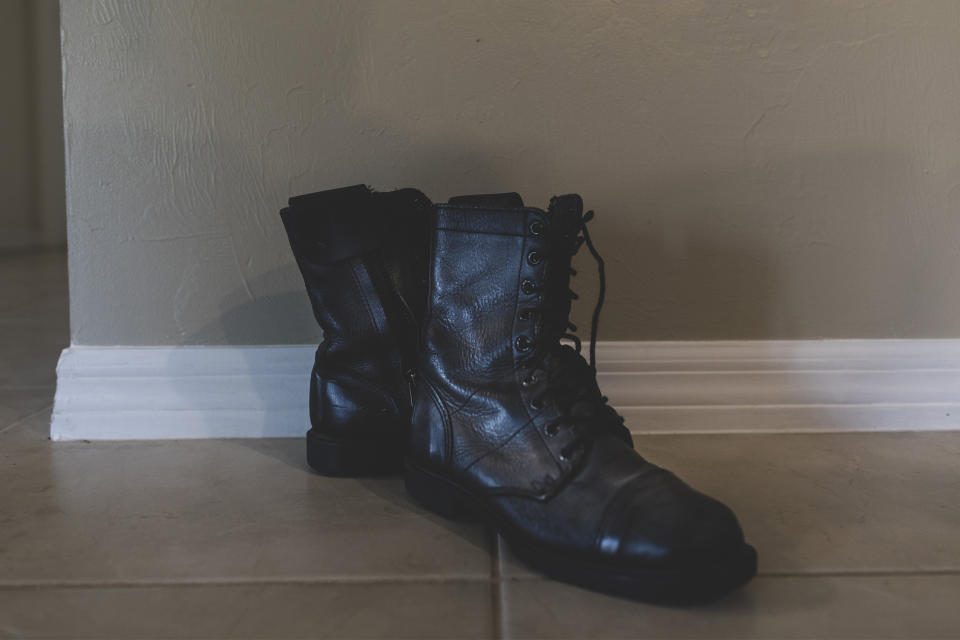 Image: Boots worn on 9/11 by Jennifer Waddleton are seen at her home on Sept. 9, 2021 in Lehigh Acres, Fla. (Saul Martinez for NBC News)