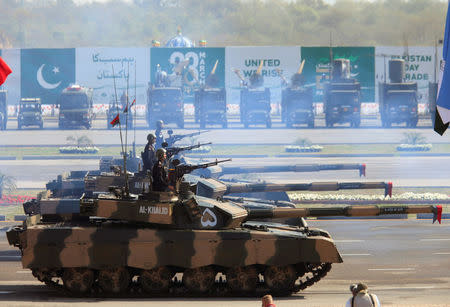 Soldiers drive Pakistan's Al Khalid tanks during Pakistan Day military parade in Islamabad, Pakistan, March 23, 2017. REUTERS/Faisal Mahmood