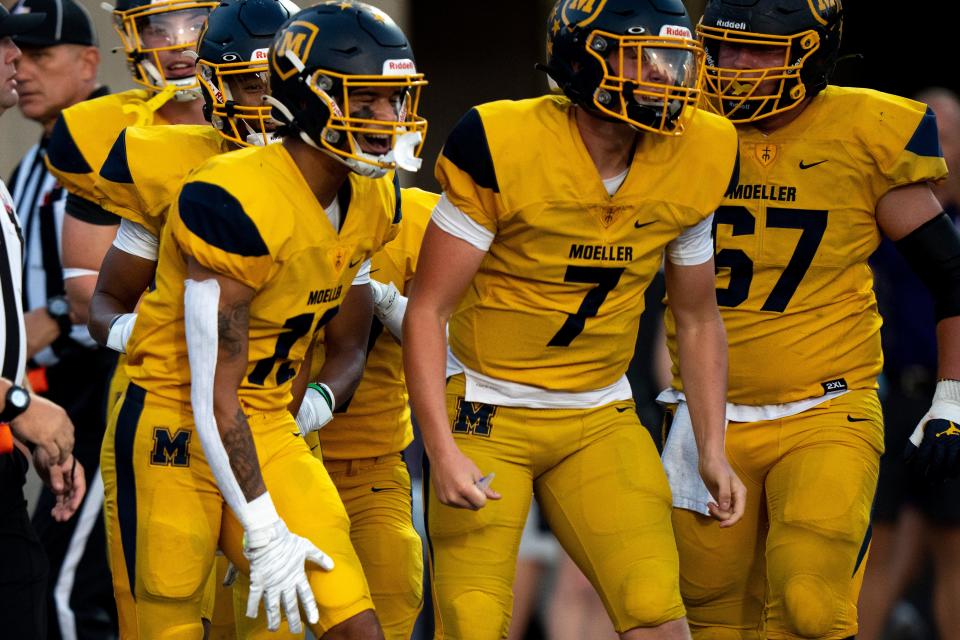 Matt Ponatoski (7) broke several Moeller passing records in leading the Crusaders to the state semifinals.