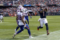 Chicago Bears quarterback Justin Fields (1) heads out of bounds for a first down during the second half of an NFL preseason football game against the Buffalo Bills Saturday, Aug. 21, 2021, in Chicago. (AP Photo/Nam Y. Huh)