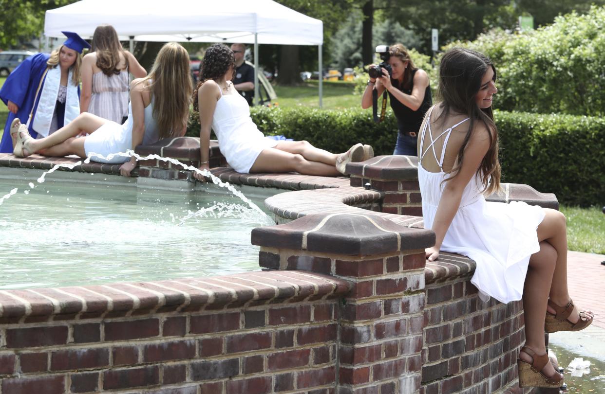 Magnolia Fountain at the University of Delaware draws seniors in their last days at the school for photos in 2018.