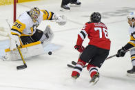 New Jersey Devils defenseman P.K. Subban (76) shoots against Pittsburgh Penguins goaltender Tristan Jarry (35) during the third period of an NHL hockey game, Sunday, April 11, 2021, in Newark, N.J. Subban scored seconds later, although the play had to be reviewed. (AP Photo/Kathy Willens)