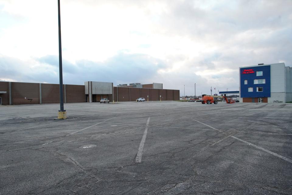 The parking lot of the Adrian Mall near the Hampton Inn and Suites and the former JCPenney location is pictured Saturday. A proposed plan would refurbish the mall into a mixed-use facility with multifamily residential housing, anchor business tenants that can draw customers back to the mall, options for retail and dining, a church and self-storage.