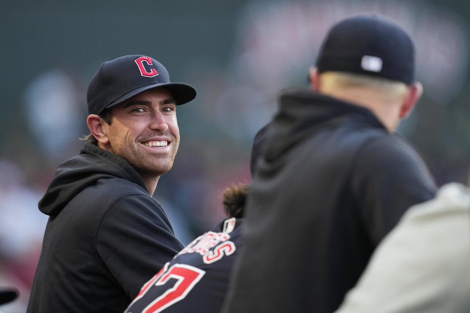 Cleveland Guardians' Shane Bieber stands in the dugout during the third inning of a baseball game against the Los Angeles Angels in Anaheim, Calif., Saturday, May 25, 2024. (AP Photo/Ashley Landis)