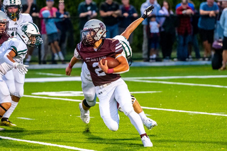 Bishop Stang's Luca Cincotta takes the open field space.