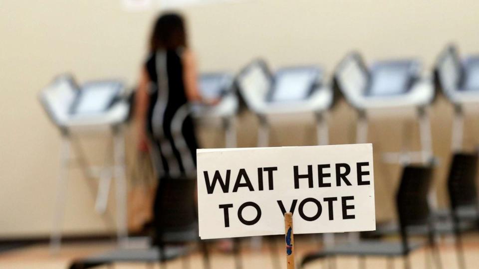 PHOTO: A woman votes in Sandy Springs, Ga. (John Bazemore/AP, FILE)