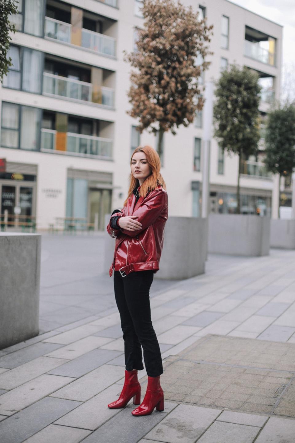 <p>PVC has been a big trend this year so the super stylish have been donning patent jackets, boots and trousers. [Photo: Hannah Louise] </p>