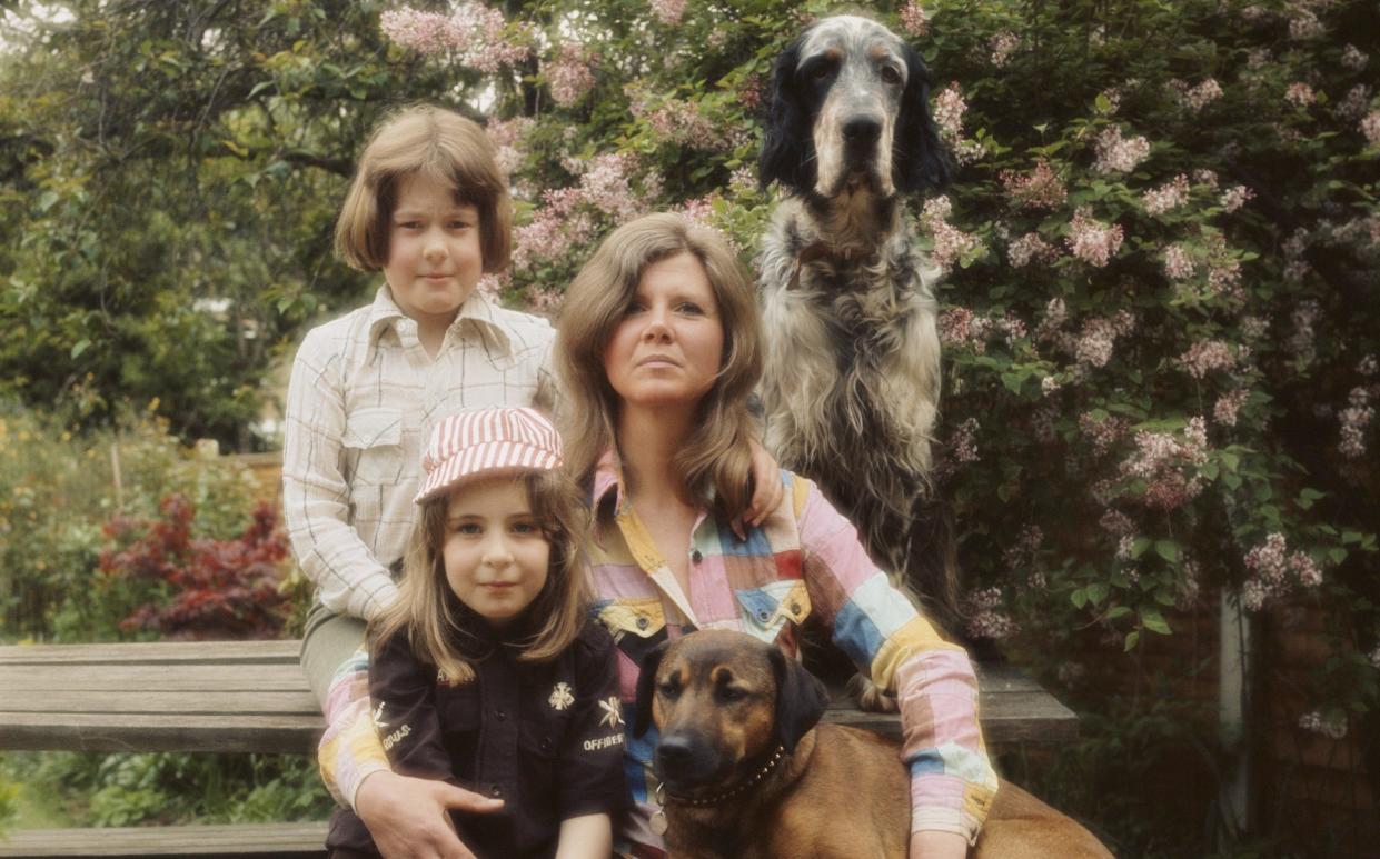 Jilly Cooper with her adopted children Felix and Emily and their dogs, circa 1978