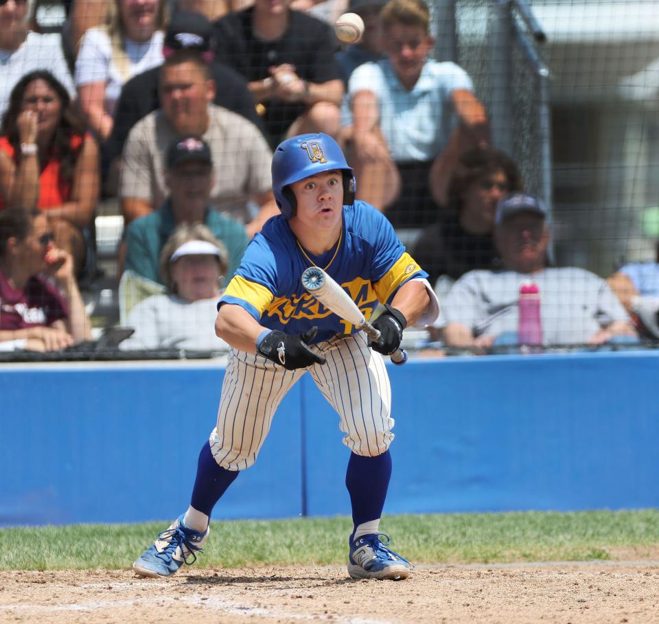 Orem’s Maddox Lamoreaux (13) bunts against Maple Mountain during a 5A baseball super regional series in Orem on Friday, May 19, 2023. | Jeffrey D. Allred, Deseret News