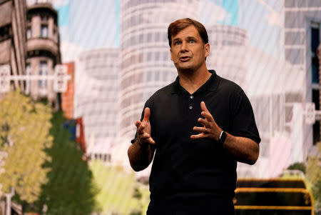 FILE PHOTO: Jim Farley, president of Global Markets, Ford Motor Company, speaks at CES in Las Vegas, Nevada, U.S. January 9, 2018. REUTERS/Rick Wilking