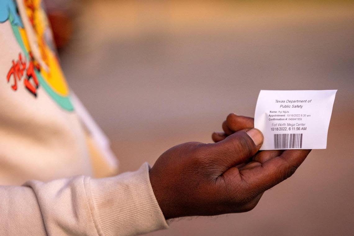 The office distributes tickets for people to return for walk-in appointments at the Texas Department of Public Safety Driver License Mega Center in Fort Worth on Tuesday, Oct. 18, 2022.