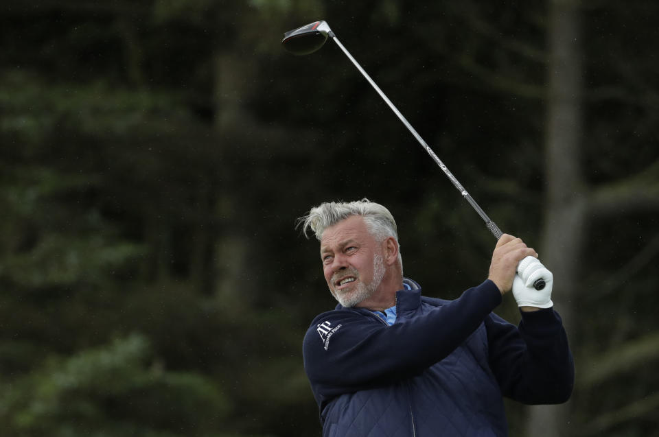 Northern Ireland's Darren Clarke hits his tee shot on the 5th hole during the first round of the British Open Golf Championships at Royal Portrush in Northern Ireland, Thursday, July 18, 2019.(AP Photo/Matt Dunham)