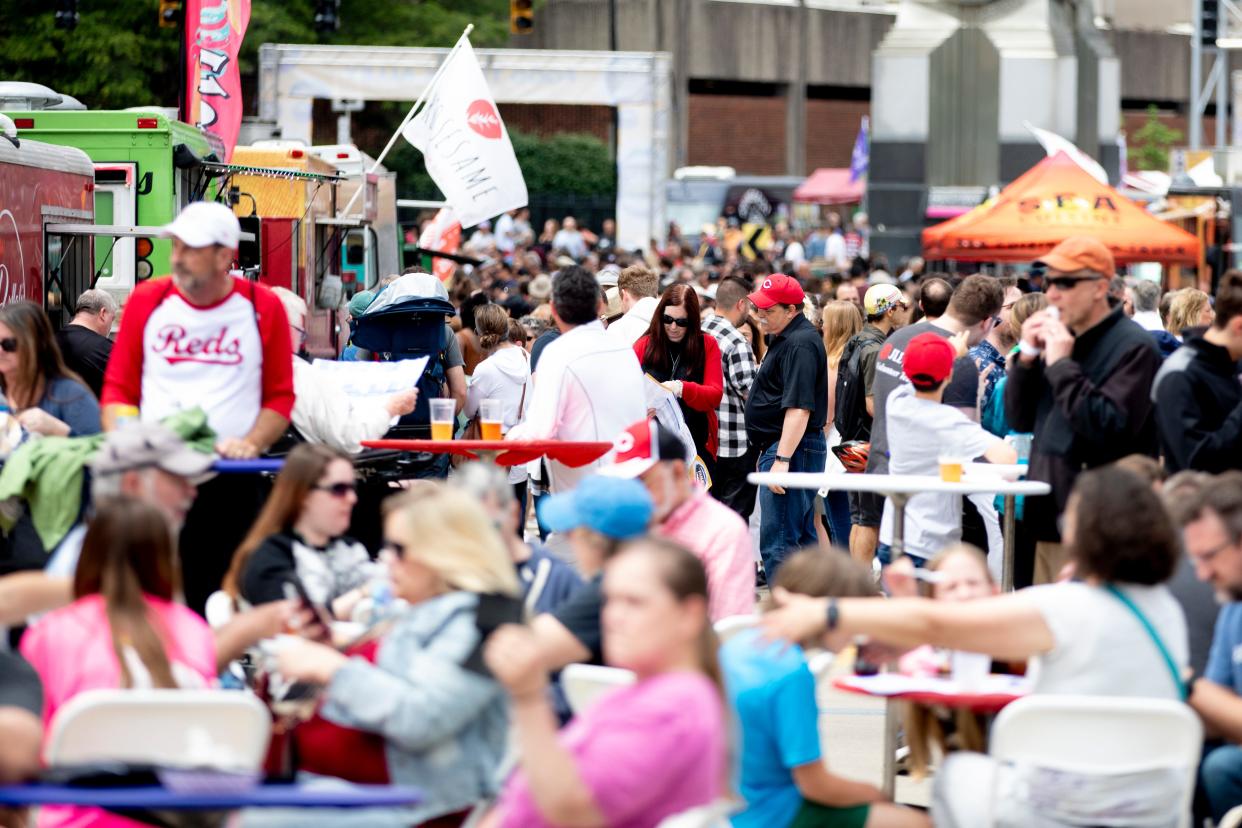 People gather during Taste of Cincinnati in Cincinnati, Saturday, May 28, 2022.