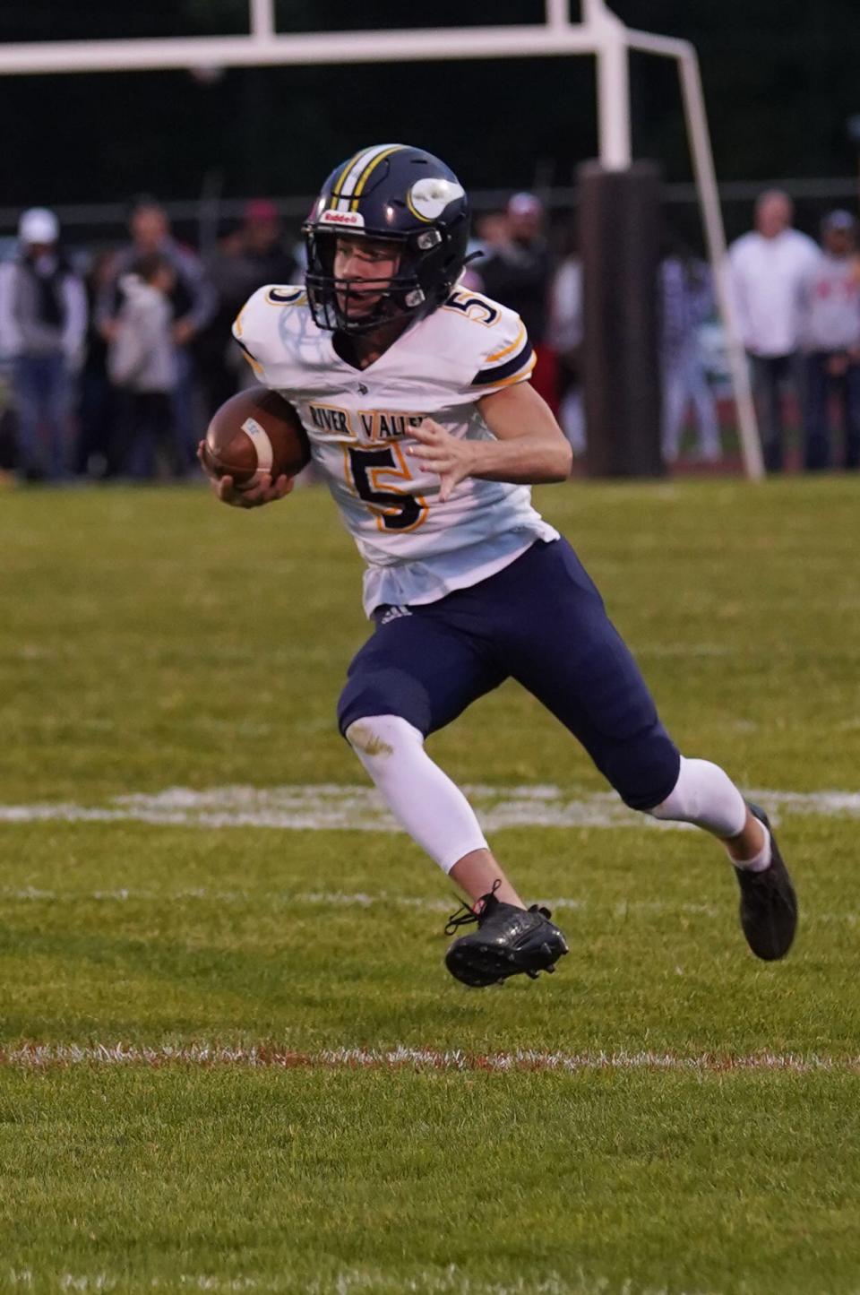 River Valley's Keyan Shidone runs after making a catch at Pleasant last football season. Shidone is one of the area's top returning receivers.