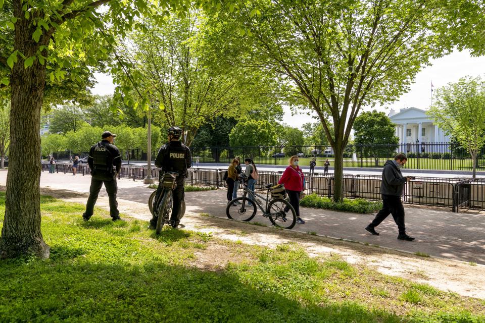 Lafayette Park, across the street from the White House, reopens in a limited capacity in Washington, Monday, May 10, 2021. Fencing remains in place around the park which will allow the Secret Service to temporarily close the park as they deem necessary. (AP Photo/Andrew Harnik)