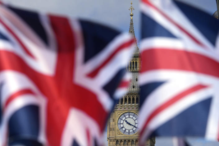 Union Jack flags are seen in front of the Elizabeth Tower, known as Big Ben, beside the Houses of Parliament in London, Friday, June 24, 2022. British Prime Minister Boris Johnson suffered a double blow as voters rejected his Conservative Party in two special elections dominated by questions about his leadership and ethics. He was further wounded when the party's chairman quit after the results came out early Friday, saying Conservatives “cannot carry on with business as usual.” (AP Photo/Frank Augstein)