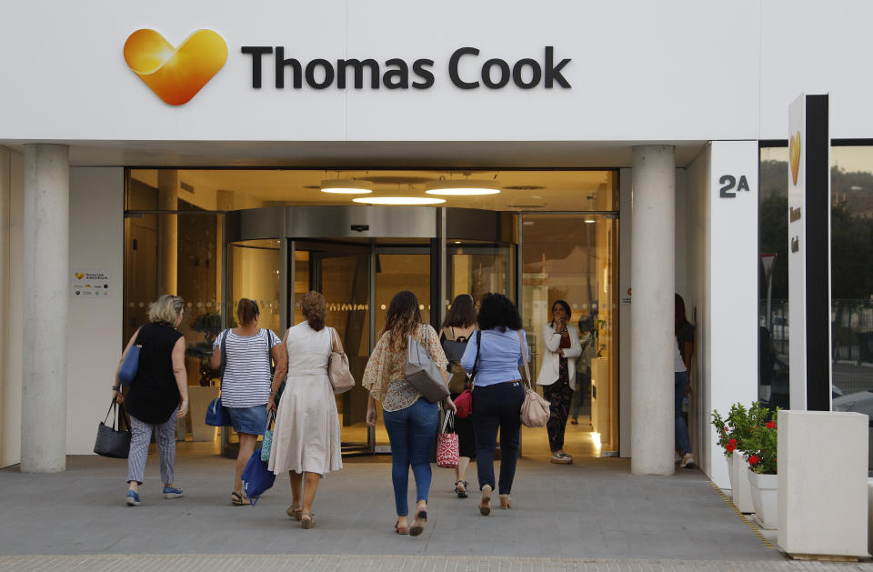 Thomas Cook workers enter the headquarters in the morning on September 24, 2019 in Mallorca, Spain. Photo: Clara Margais/Getty Images