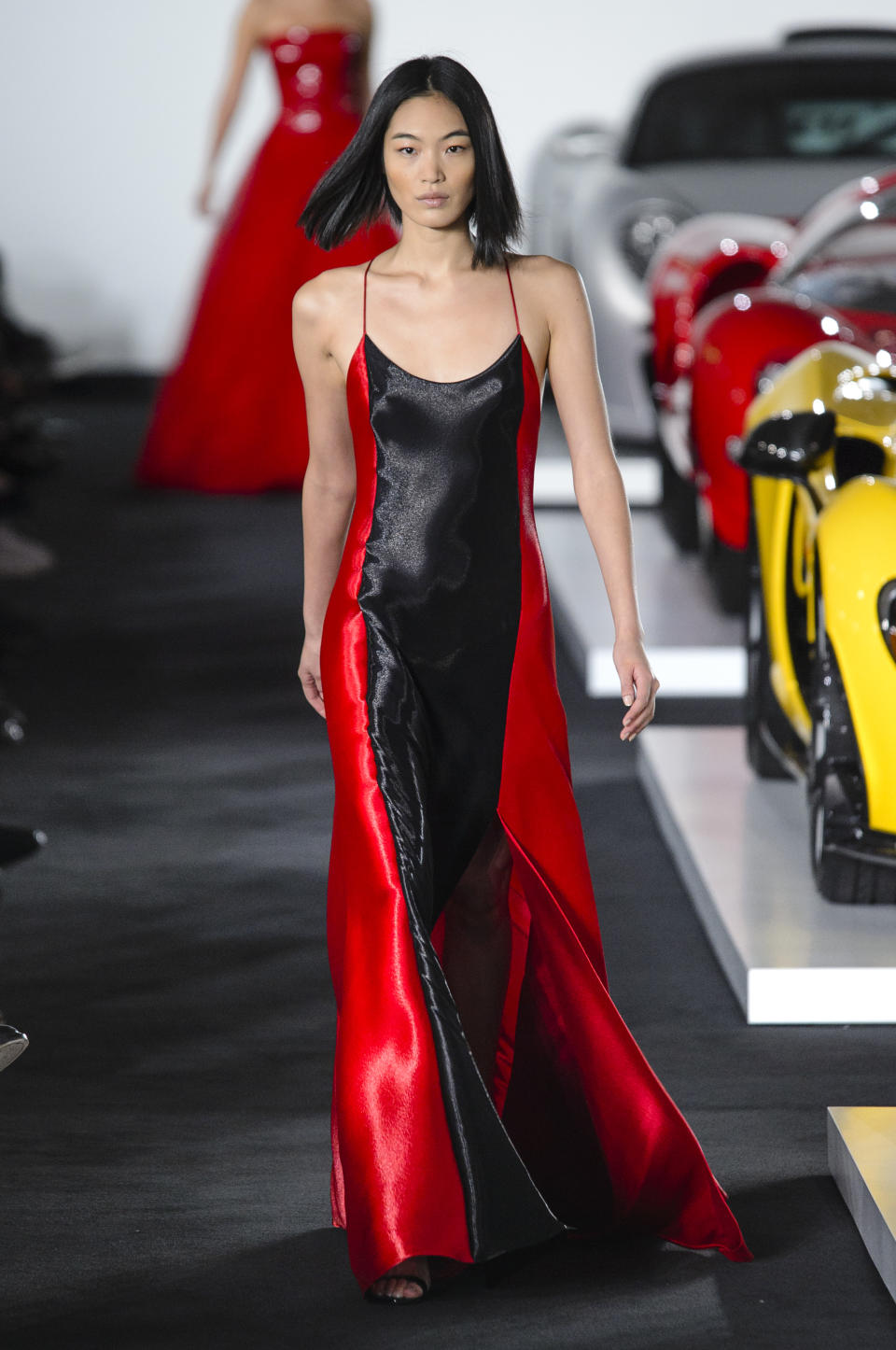 <p><i>Model wears a black-and-red color-block dress from the SS18 Ralph Lauren collection. (Photo: IMAXtree) </i></p>