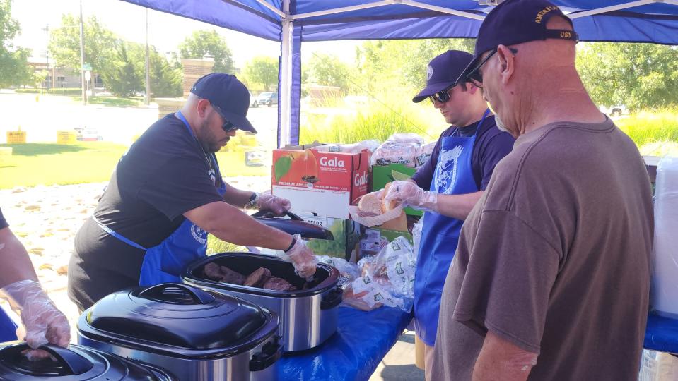 Hamburgers and hot dogs are served Friday at the 17th annual Boots and Badges Blood Drive at the Coffee Memorial Blood Center in Amarillo.