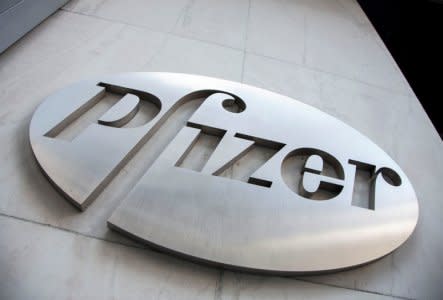 FILE PHOTO: The Pfizer logo is seen at their world headquarters in New York April 28, 2014.  REUTERS/Andrew Kelly/File Photo