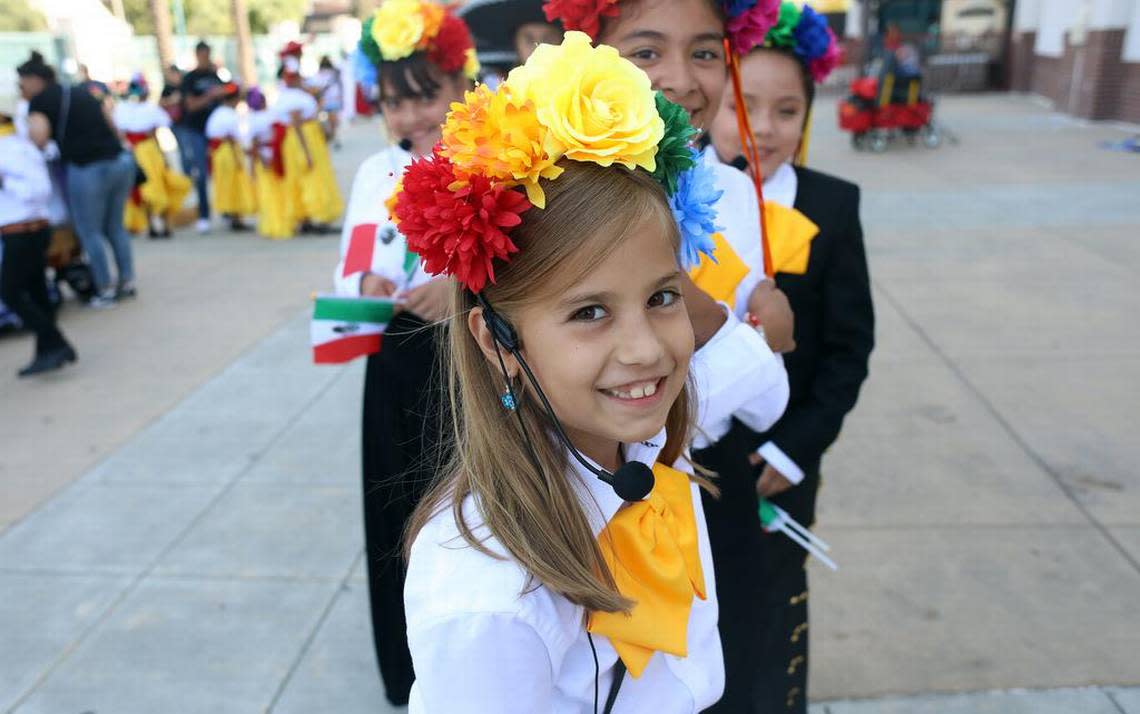A member of Mariachi Estrellas of Leavenworth smiles while waiting for the Sept. 17, 2022 parade that kicked off the Fiestas Patrias celebration in downtown Fresno.