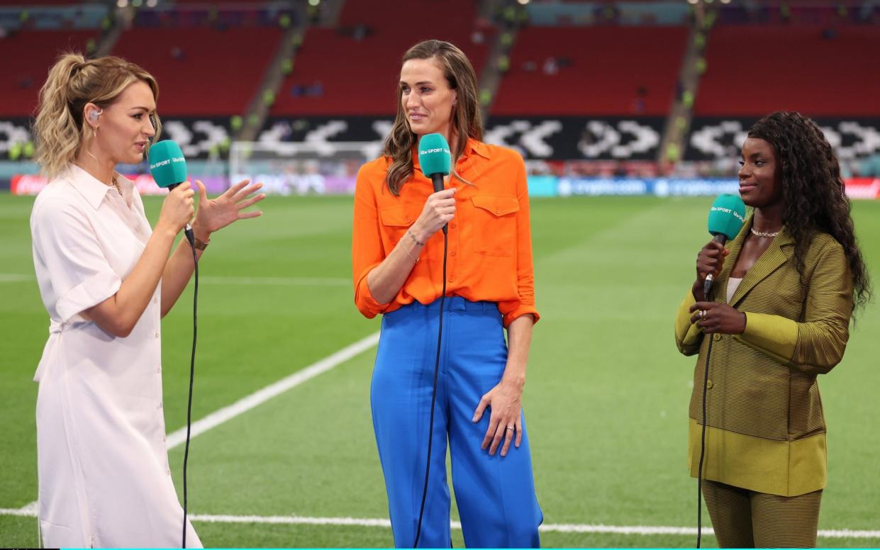 Laura Woods, Jill Scott and Eni Aluko of ITV Sport look on prior to the FIFA World Cup Qatar 2022 quarter final match between England and France at Al Bayt Stadium