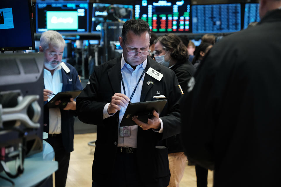 NEW YORK, NEW YORK - APRIL 28: Traders work on the floor of the New York Stock Exchange (NYSE) on April 28, 2022 in New York City. The Dow Jones Industrial Average was up in morning trading as markets continued to move through a period of volatility over inflation concerns and the war in Ukraine. (Photo by Spencer Platt/Getty Images)