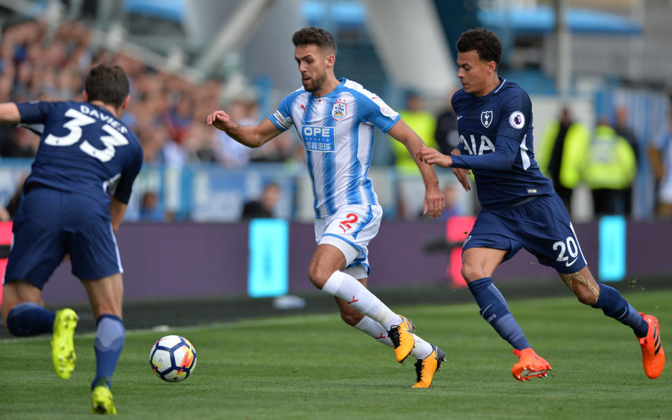 <p>Huddersfield Town’s Tommy Smith in action with Tottenham’s Dele Alli (R) and Ben Davies (REUTERS/Peter Powell) </p>