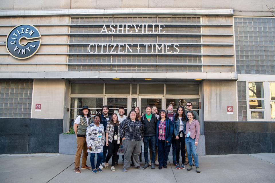 The Citizen Times staff in front of the building that housed the newspaper for 85 years, March 20, 2024.