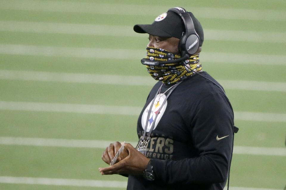 Pittsburgh Steelers head coach Mike Tomlin watches play against the Dallas Cowboys in the second half of an NFL football game in Arlington, Texas, Sunday, Nov. 8, 2020. (AP Photo/Michael Ainsworth)