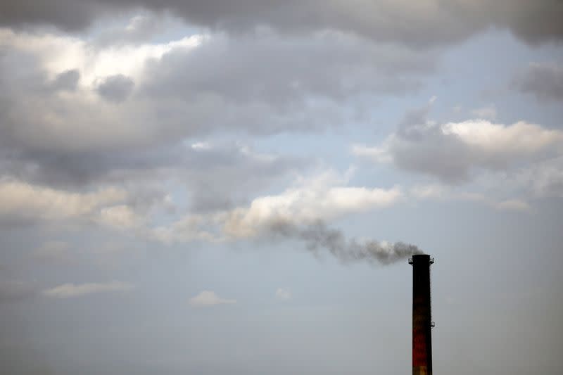Smoke rises from a coke factory in the village of Lukavac near Tuzla