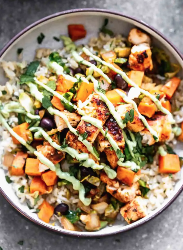 <p>Cooking for Keeps</p><p>These blackened chicken brown rice bowls are packed with spicy seared chicken, sweet potatoes, black beans and hearty brown rice. They’re tossed with plenty of cilantro and then drizzled with an easy avocado cream sauce.</p><p><strong>Get the recipe: <a href="https://www.cookingforkeeps.com/blackened-chicken-brown-rice-bowls-with-avocado-cream/" rel="nofollow noopener" target="_blank" data-ylk="slk:Blackened Chicken Brown Rice Bowls;elm:context_link;itc:0;sec:content-canvas" class="link rapid-noclick-resp"><em>Blackened Chicken Brown Rice Bowls</em></a></strong></p>