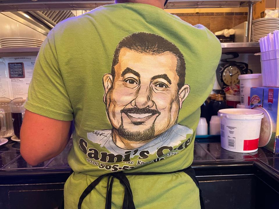 All the employees wear T-shirts sporting Bassam Natour’s logo at Sami’s Café, 9700 Kingston Pike, Tuesday, July 5, 2022.