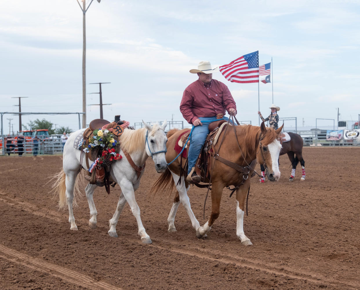 A horse with an empty saddle is led around the arena to honor those that passed at the 2023 Will Rogers Range Riders Rodeo in Amarillo.