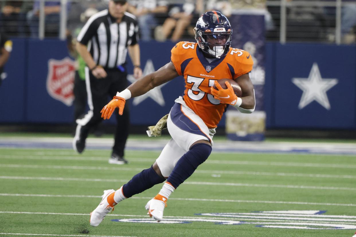 Broncos RB Javonte Williams tore his ACL in Week 4 of the 2022 season. (AP Photo/Michael Ainsworth)