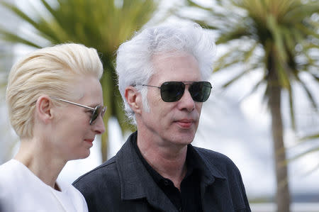 72nd Cannes Film Festival - Photocall for the film "The Dead Don't Die" in competition - Cannes, France, May 15, 2019. Cast member Tilda Swinton and Director Jim Jarmusch pose. REUTERS/Stephane Mahe