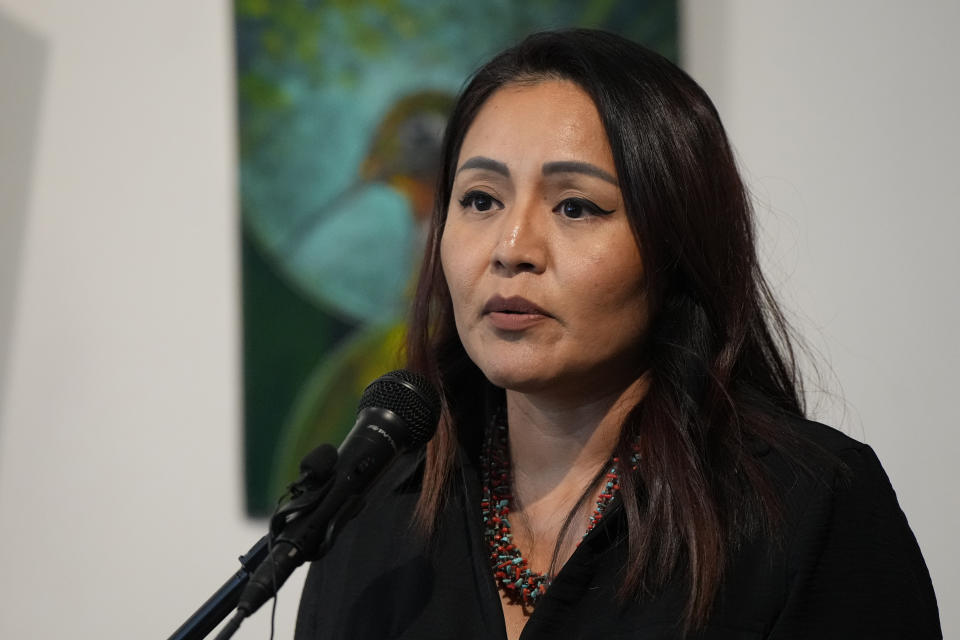 Amanda Blackhorse speaks during a news conference by Native American advocacy groups, Thursday, Feb. 9, 2023, in Phoenix. The groups are calling for the NFL football team Kansas City Chiefs to drop their name, logo and their trademark “war chant” where fans make a chopping-hand gesture mimicking the Native American tomahawk. They play to demonstrate outside State Farm Stadium in the Phoenix suburb of Glendale during the Super Bowl 57 NFL football game. (AP Photo/Rick Scuteri)