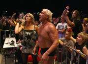 <p>Ric Flair looks on while awaiting the entrance of Hulk Hogan during the Hulkamania Tour at the Burswood Dome on November 24, 2009 in Perth, Australia. (Photo by Paul Kane/Getty Images) </p>