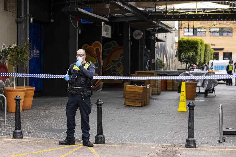 A police presence is seen outside the Barkly Square shopping centre in Brunswick, Melbourne.