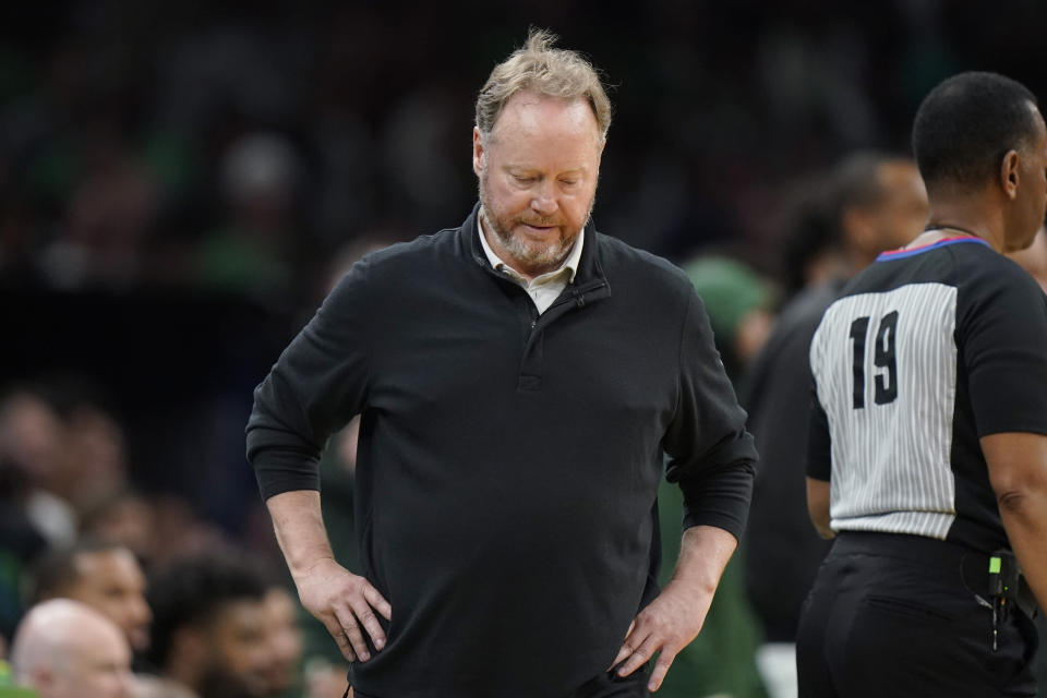 Milwaukee Bucks head coach Mike Budenholzer walks in front of the bench as the Bucks trail the Boston Celtics during the second half of Game 7 of an NBA basketball Eastern Conference semifinals playoff series, Sunday, May 15, 2022, in Boston. (AP Photo/Steven Senne)