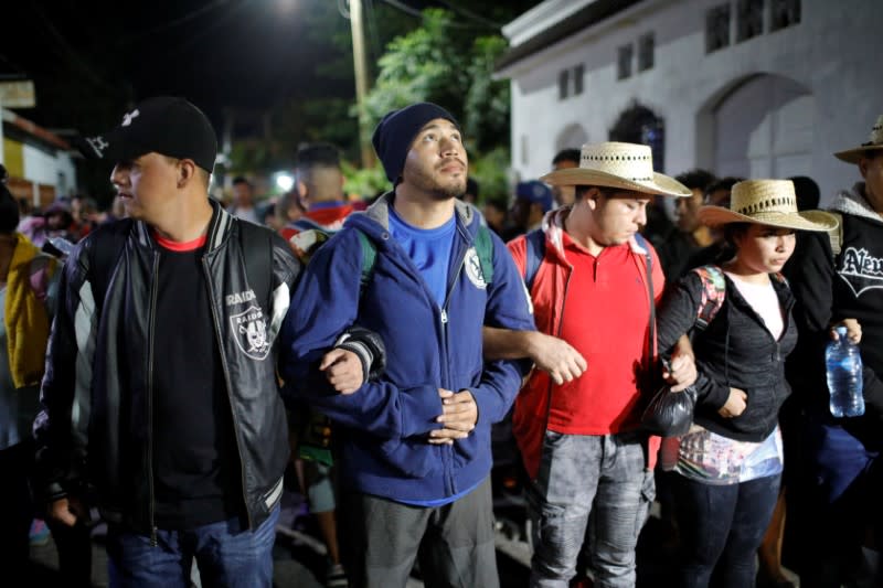 Large migrant caravan prepares to enter Mexico from Guatemala