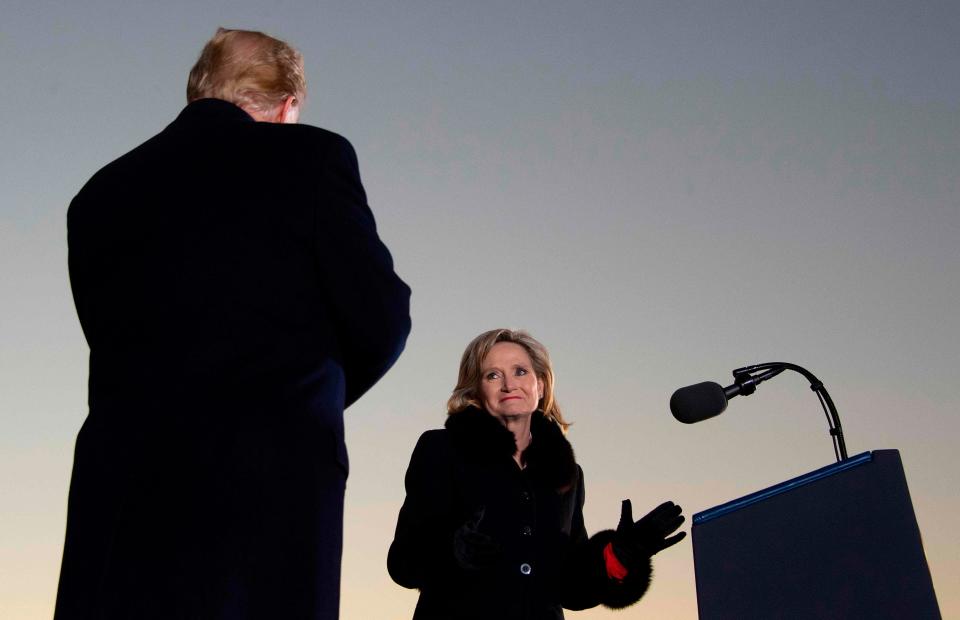 President Donald Trump arrives to deliver remarks for Republican Sen. Cindy Hyde-Smith on November 26, 2018.