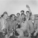 Race car driver Carroll Shelby, of Dallas, Texas, is surrounded by fans after winning the 24-hours endurance race at Le Mans, France, June 21, 1959. He and teammate Roy Salvadori, not shown, drove their Aston Martin to victory at an average speed of 181 kmh. (AP Photo/Jacques Marqueton)