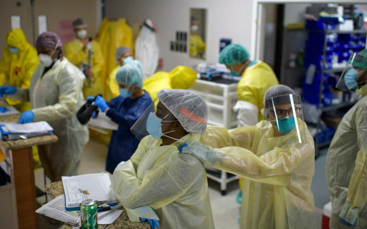 One health worker has died every 30 mins during the pandemic, Amnesty International said - Mark Felix/AFP