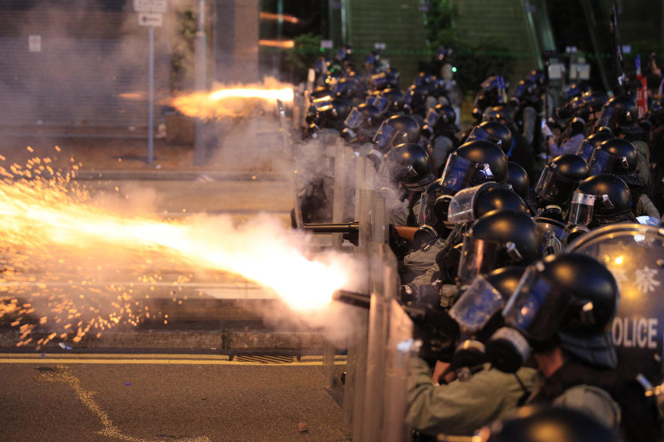 Hong Kong police fire tear gas at protesters in Sai Wan, Hong Kong on Sunday, July 28, 2019. Police fired tear gas at protesters in Hong Kong on Sunday for the second night in a row in another escalation of weeks-long pro-democracy protests in the semi-autonomous Chinese territory. (Jeff Cheng/HK01 via AP)