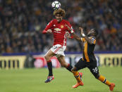 Football Soccer Britain- Hull City v Manchester United - Premier League - The Kingston Communications Stadium - 27/8/16 Manchester United's Marouane Fellaini in action with Hull City's Adama Diomande Action Images via Reuters / Lee Smith Livepic EDITORIAL USE ONLY. No use with unauthorized audio, video, data, fixture lists, club/league logos or "live" services. Online in-match use limited to 45 images, no video emulation. No use in betting, games or single club/league/player publications. Please contact your account representative for further details.