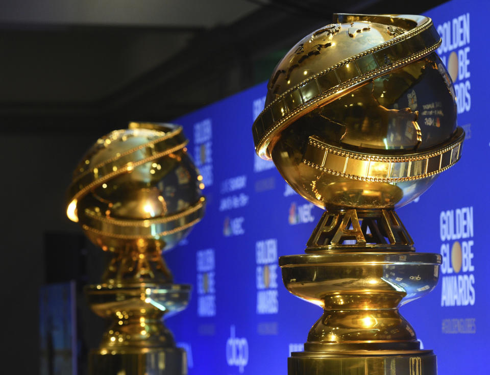 Replicas of Golden Globe statues in Beverly Hills, CA - Credit: Chris Pizzello/Invision/AP