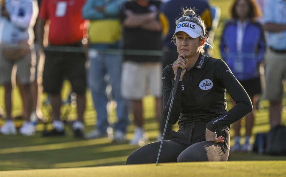 Nelly Korda waits to putt on the 18th green during the first hole of sudden-death after a four-way tie in the LPGA Pelican Women's Championship golf tournament at Pelican Golf Club, Sunday, Nov. 14, 2021, in Belleair, Fla. (AP Photo/Steve Nesius)